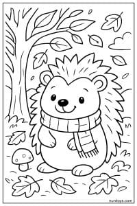 דף צביעה של קיפוד עם צעיף בין עלים נושרים בסתיו