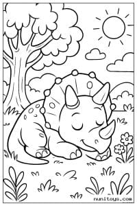 Coloriage bébé tricératops endormi sous un grand arbre fleuri